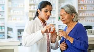 Pharmacist counseling patient